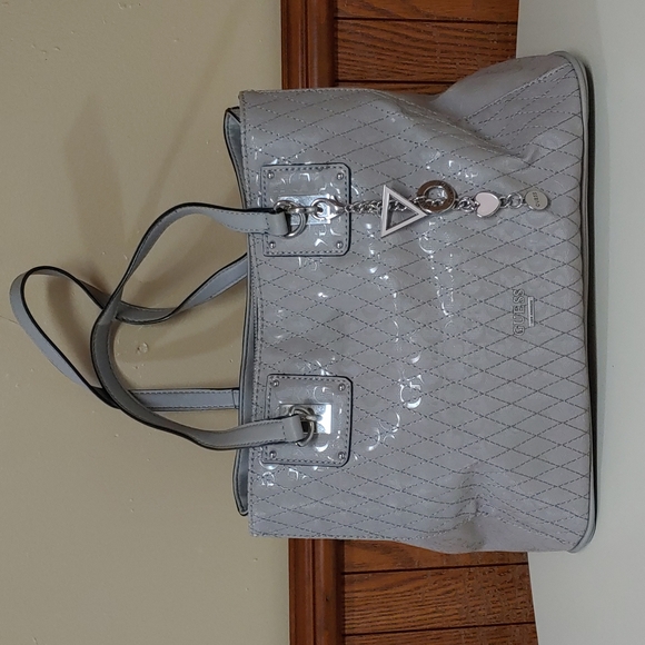 Guess Handbags - Guess NWOT Large Shiny Leather Shoulder Bag